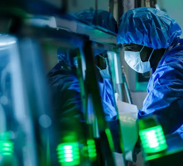 Researchers working in a lab environment